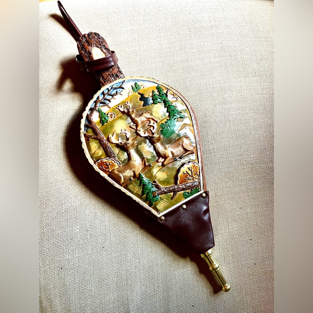 3-D woodland deer-scape fire bellows.
